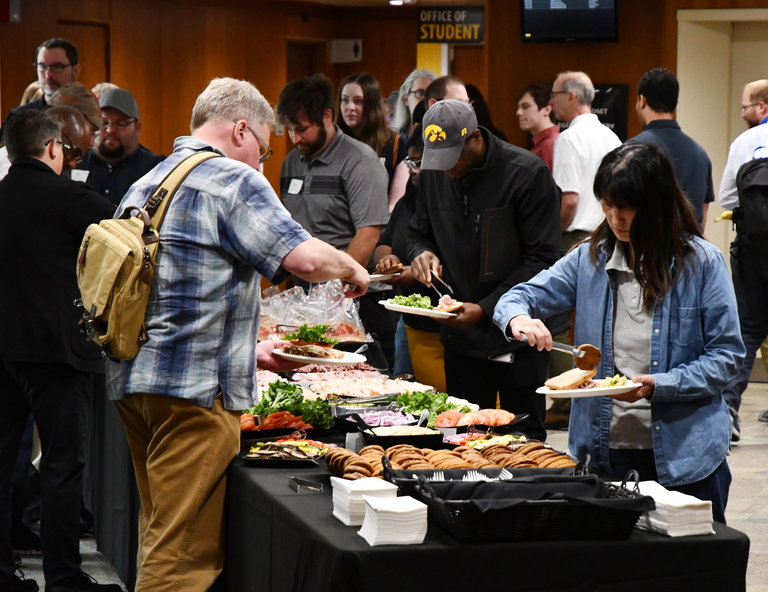 Tech Forum attendees go through lunch buffet line