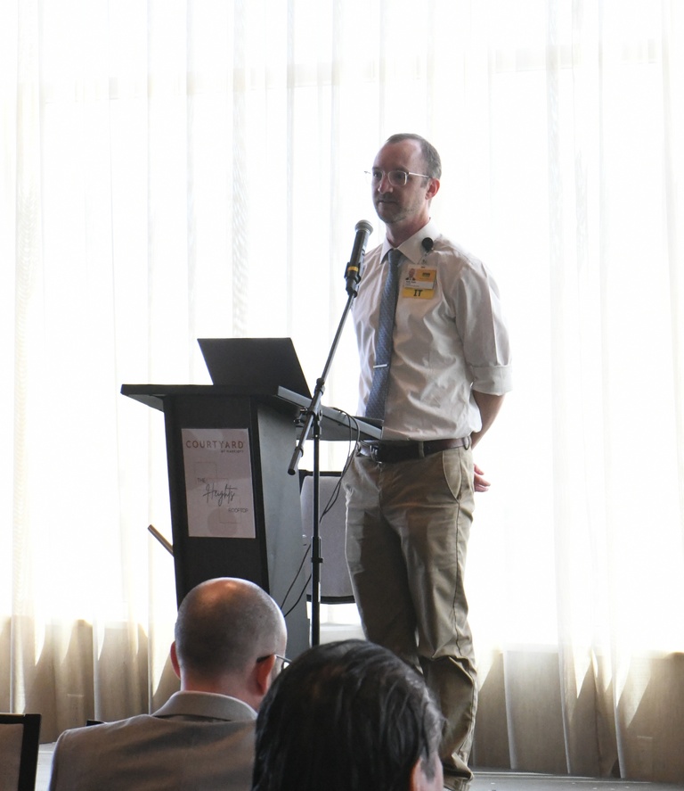 Andy Evans, assistant director for integrated communication solutions, Health Care Information Systems presents at Tech Forum